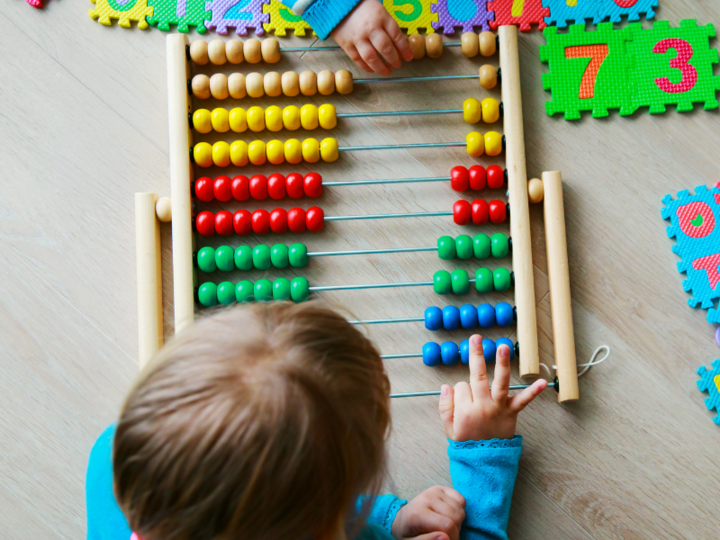 children counting with an abacus
