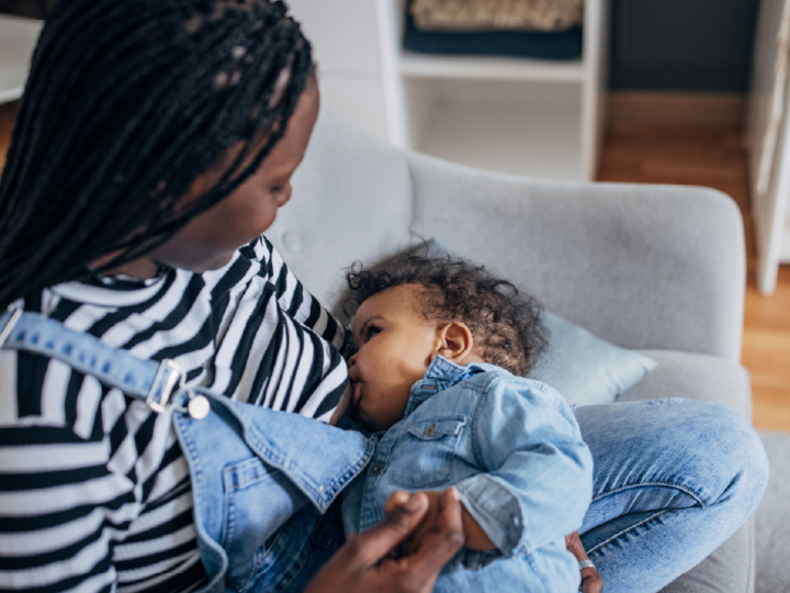 Mother feeding an infant