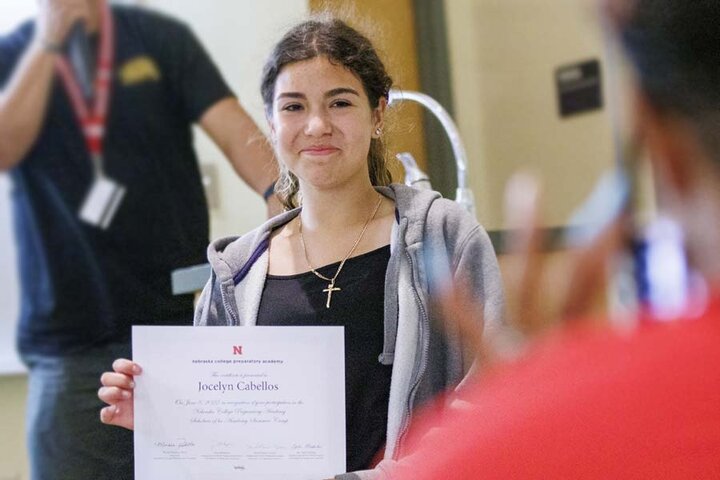 Student with certificate